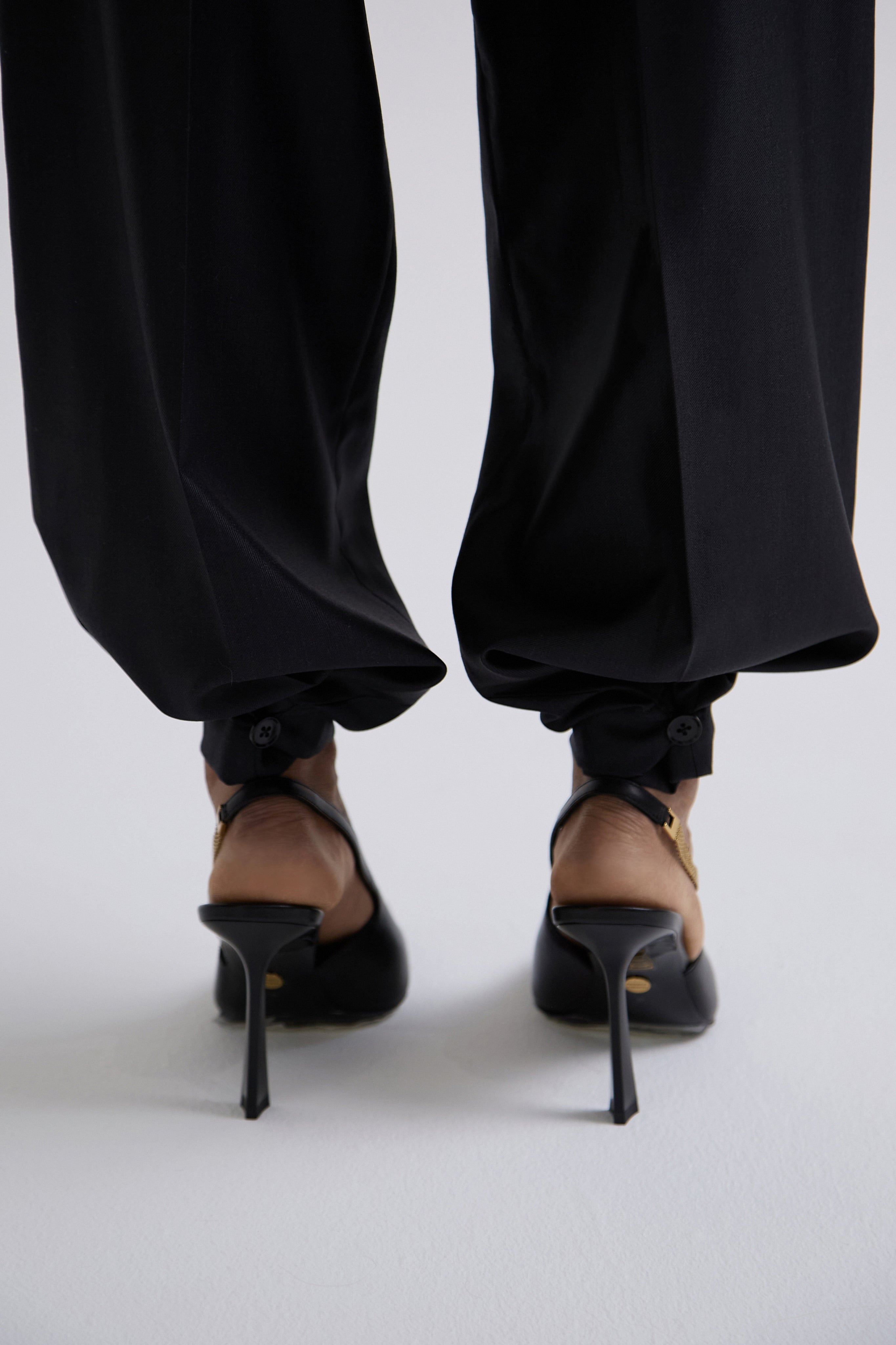 "Meteorite" convertible trousers made of silk and wool