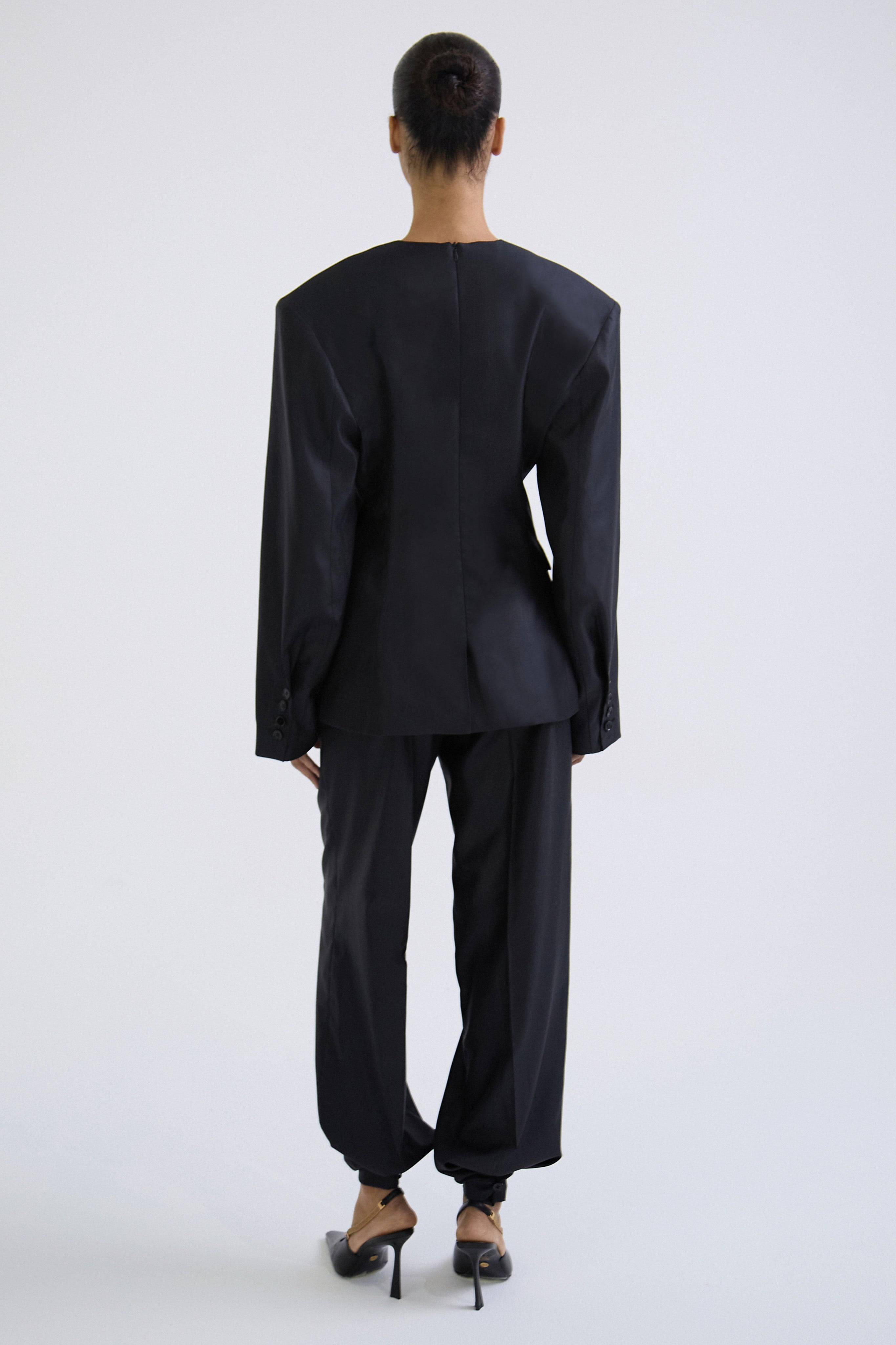 "Meteorite" convertible trousers made of silk and wool